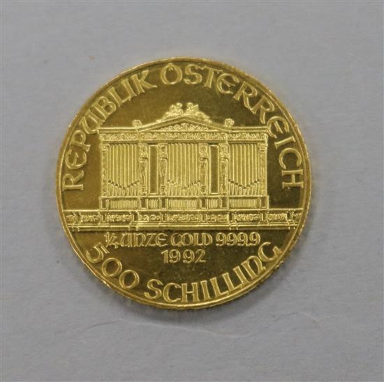 A gold Austrian shilling dated 1992.